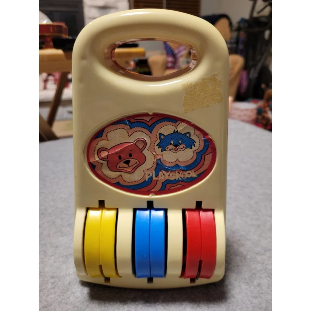 Retro Playskool Toy with Rotating Wheels